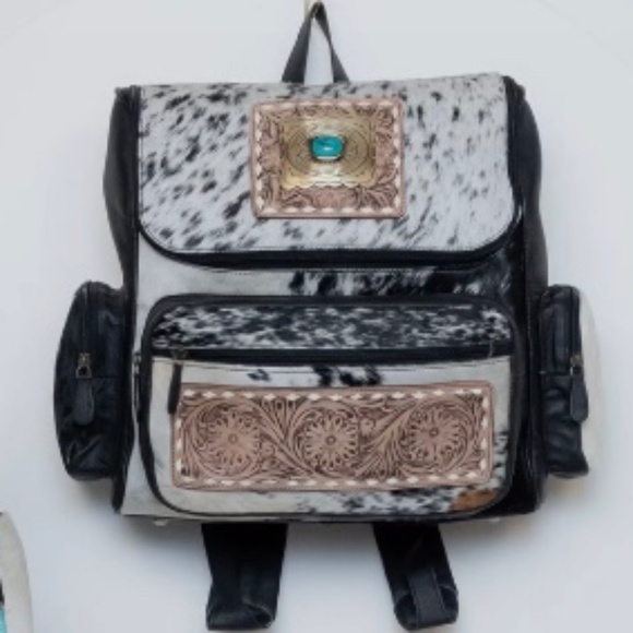 Concho/cowhide genuine leather tooled